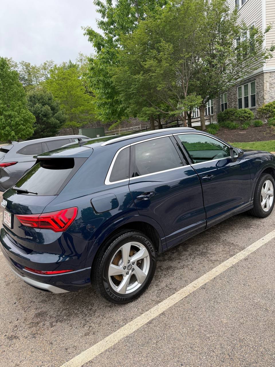 exterior car detailing Massachusetts — Audi black sedan shining after full detail by Deelway Mobile Detailing