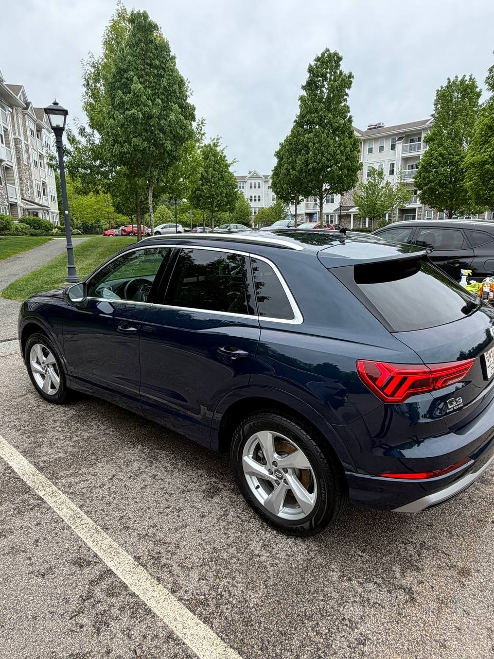 Full car detail Massachusetts — Audi black sedan exterior after professional detail