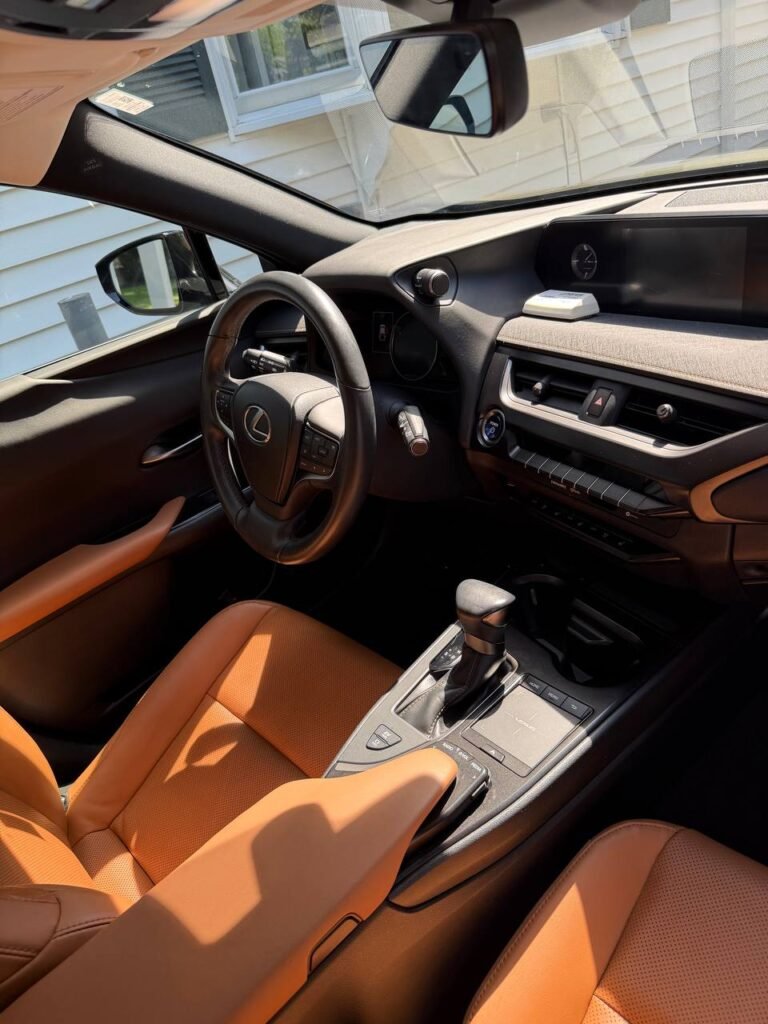 BMW interior dashboard and center console after professional mobile detailing by Deelway in Massachusetts