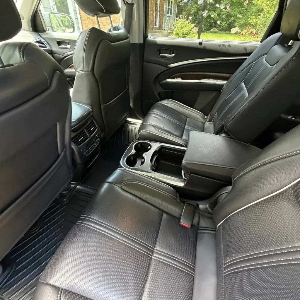 Clean WeatherTech floor mats in truck cab after professional mobile detailing service Massachusetts