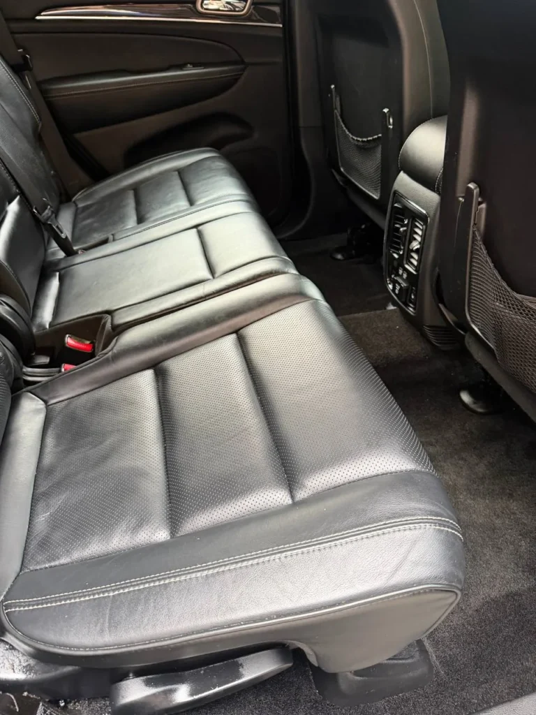 Clean floor mat and interior detailing detail showcasing Deelway Mobile Detailing quality Massachusetts