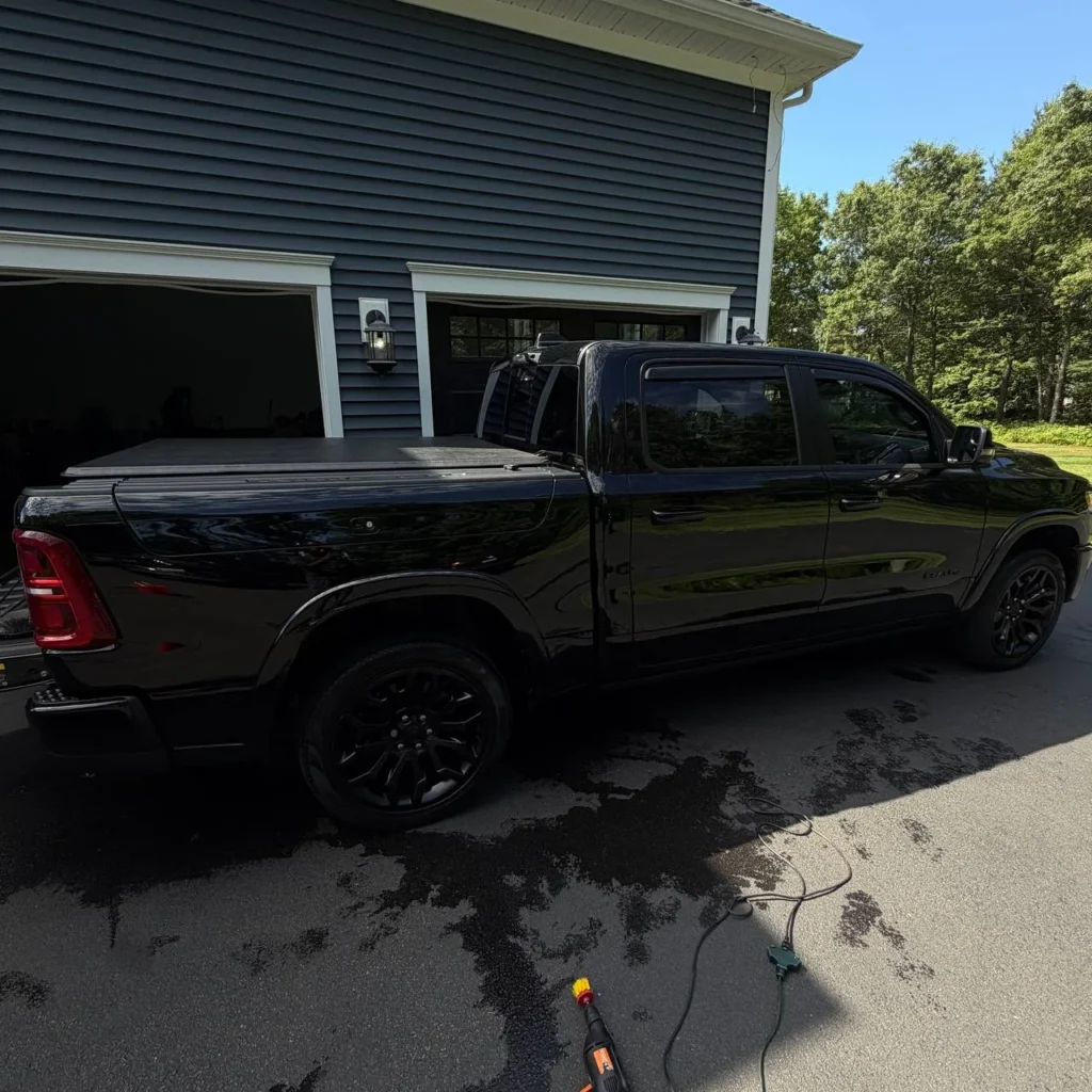 Ram 1500 Limited luxury interior detailing with burgundy leather seats and large touchscreen Massachusetts